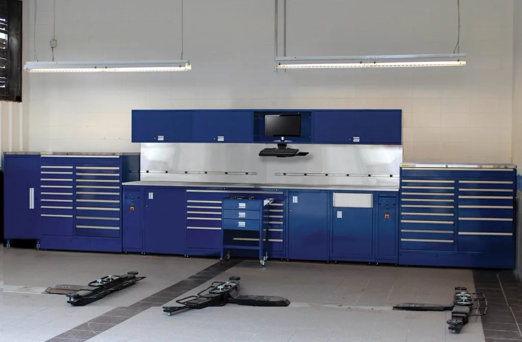 Shure Manufacturing SHURETECH workbench system installed along a shop wall